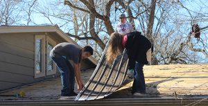 Teens rebuild flood-damaged homes in youth minister’s hometown